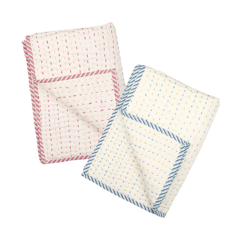 Two Baby Kantha Quilts, one with a pink striped pattern and one with a blue striped pattern, laid flat.