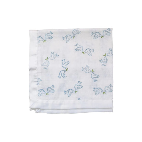 A white cotton muslin cloth with a blue dove print, folded neatly.