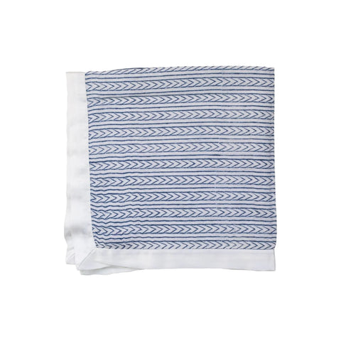 folded muslin square with an indigo stripe print