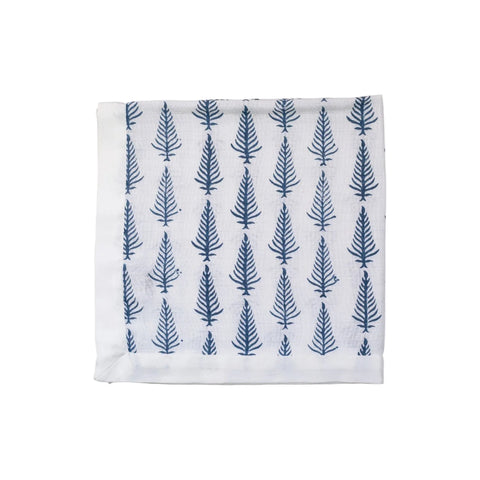 A white cotton muslin cloth with an indigo blue feather print, generously trimmed with satin on the edges.