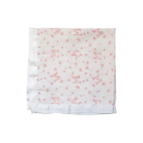 satin trimmed muslin square with pink letter M printed on a white background