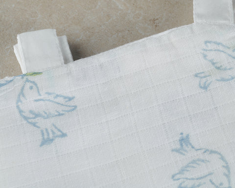 satin tabbed muslin comforter blue dove print