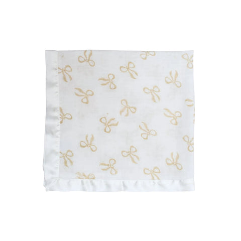 a folded baby muslin with satin trim and a taupe bow print