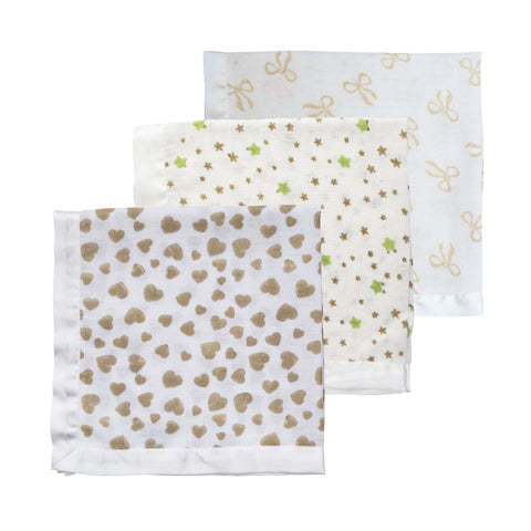 A trio of muslin cloths for babies in a range of taupe block-printed designs