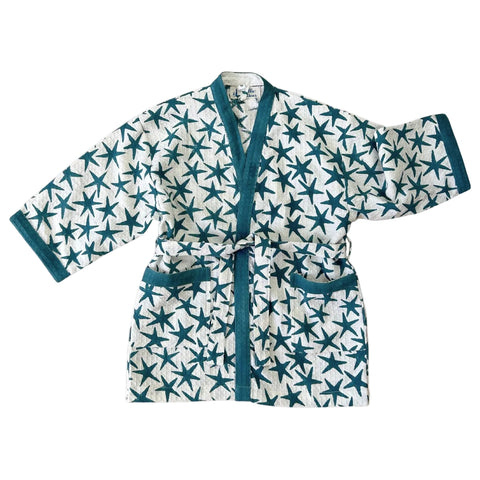 A cotton dressing gown with a star print in blue, green, and pink, displayed on a white background.